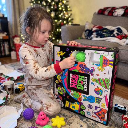 Raw UGC - child opening a door of the giant calendar